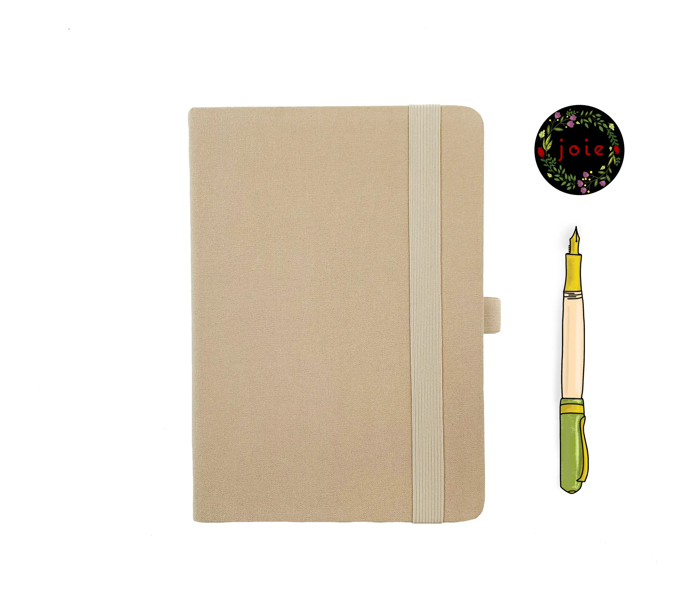 Light yellow fabric journal with rounded corners, elastic closure, pen holder, and dual bookmarks—paired with an illustrated fountain pen and floral 'joie' logo