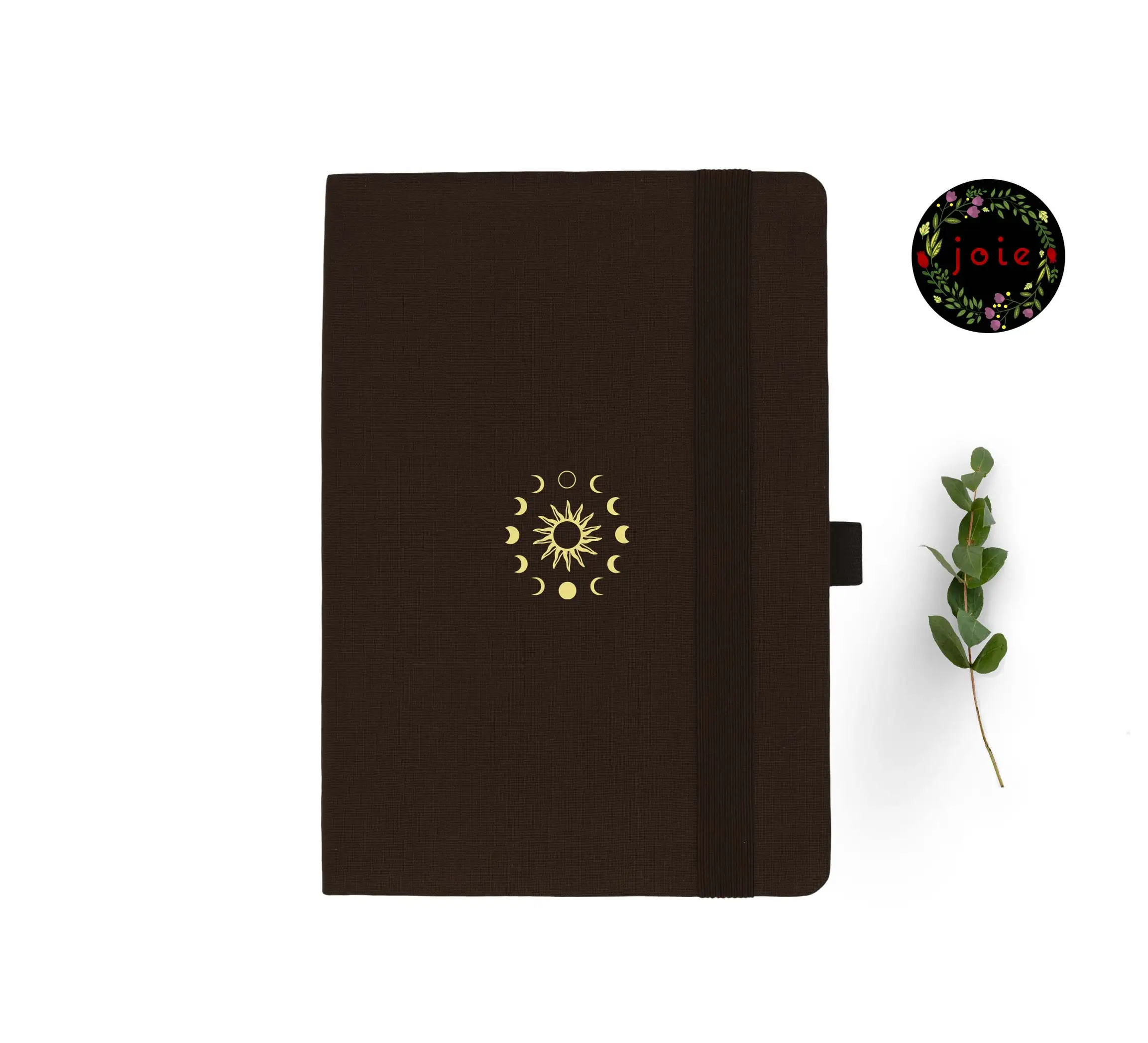 A5 dot grid notebook with sun and moon design on cover